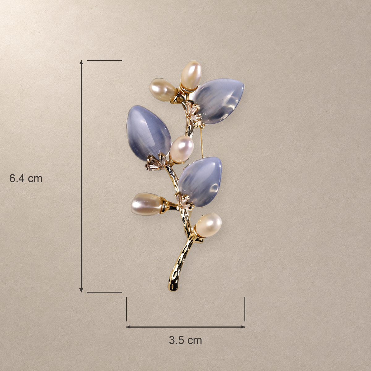 Blue cat-eye stone flower branch brooch size illustration, approximately 3.5 cm wide and 6.4 cm high