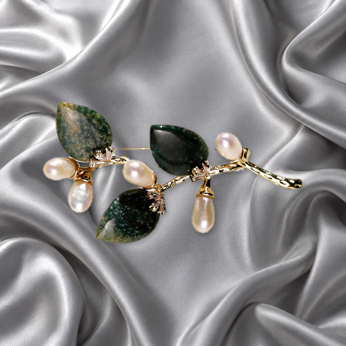 Dark Green natural stone flower branch brooch with freshwater pearls on silver-grey satin