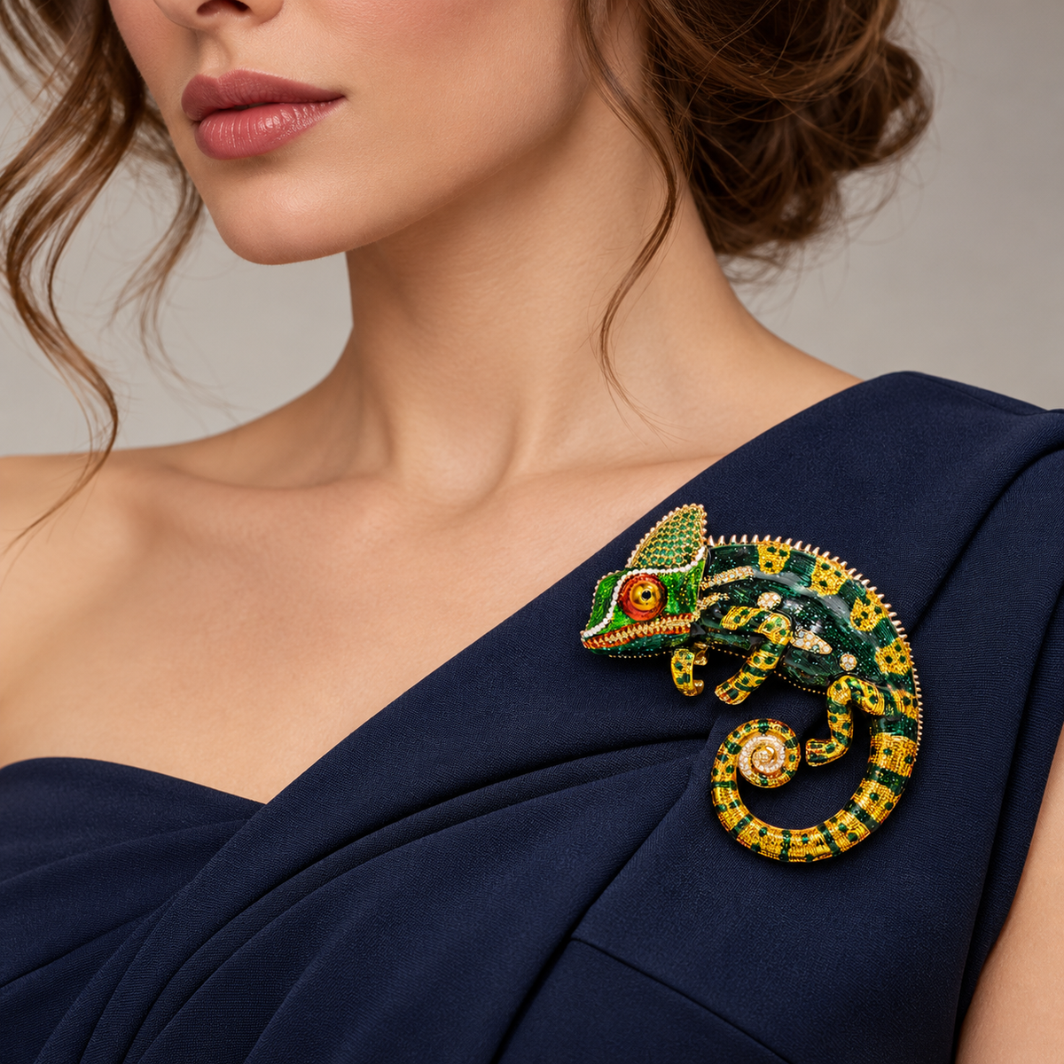 Green chameleon brooch worn on formal clothing