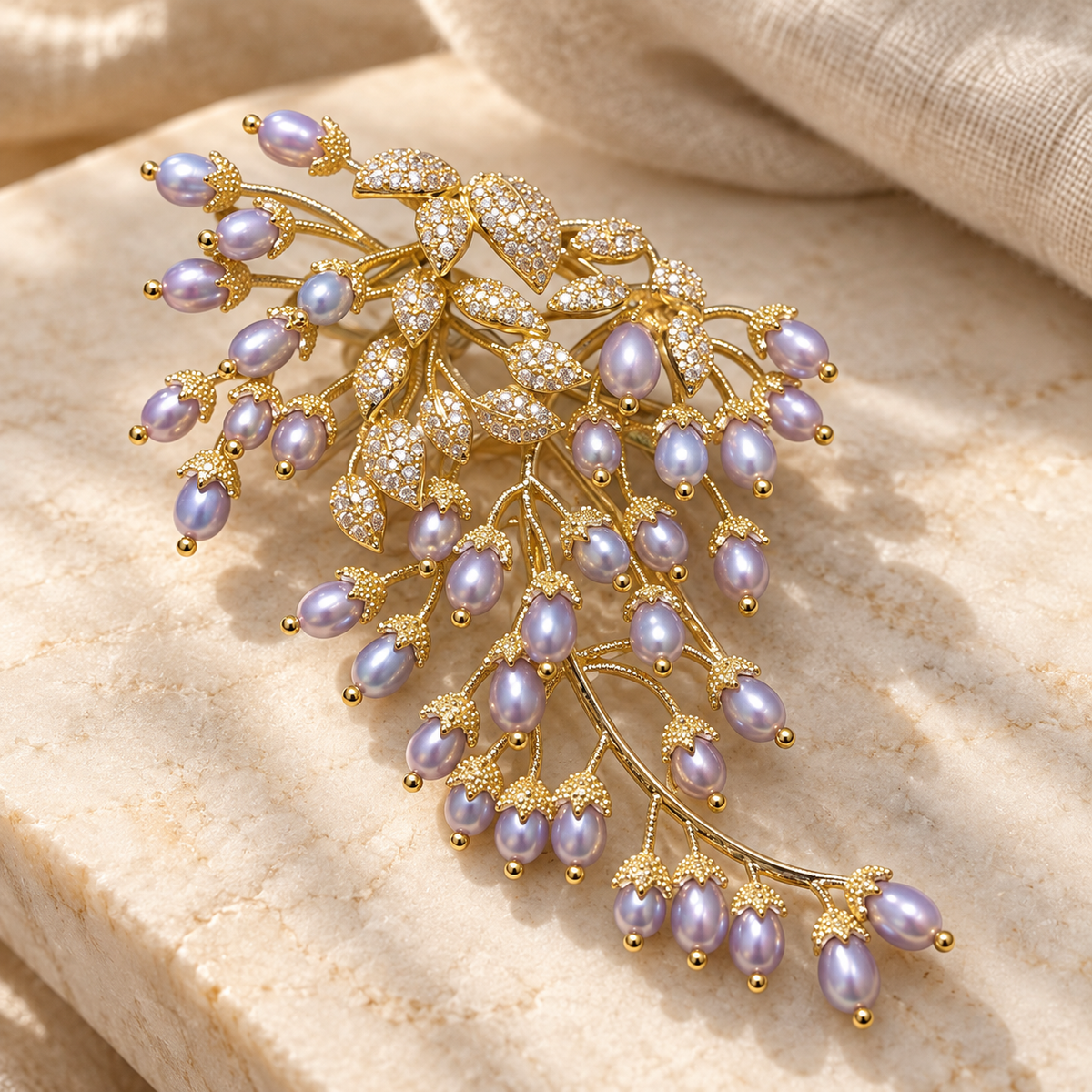 Natural Gray Freshwater Pearl wisteria brooch, styled tabletop display