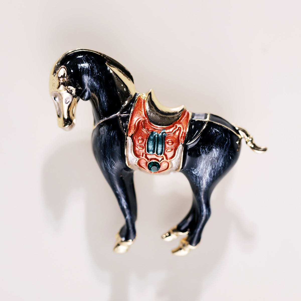 Black horse brooch with decorative saddle detailing