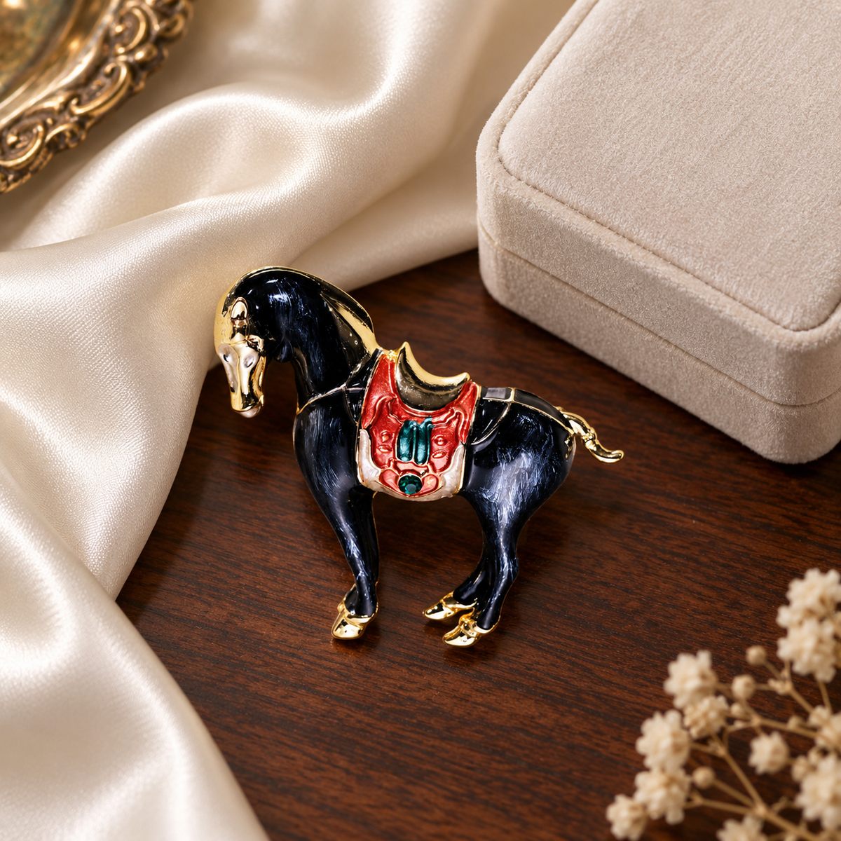 Black horse brooch styled in a tabletop setting