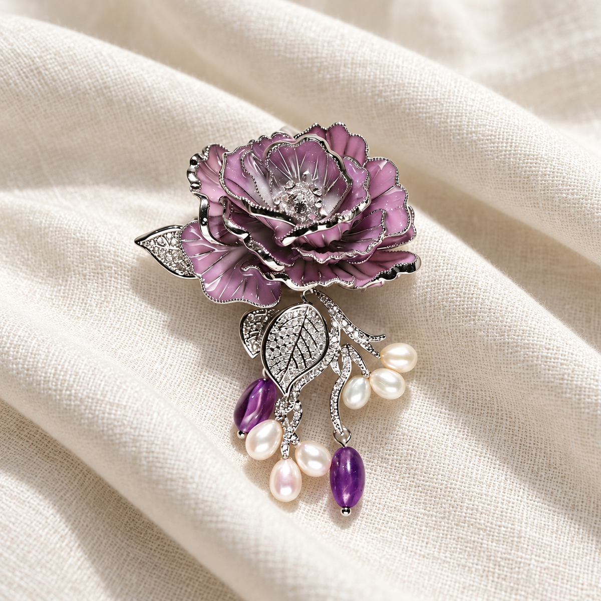 Purple Rose With Freshwater Pearls enamel rose brooch in a tabletop setting