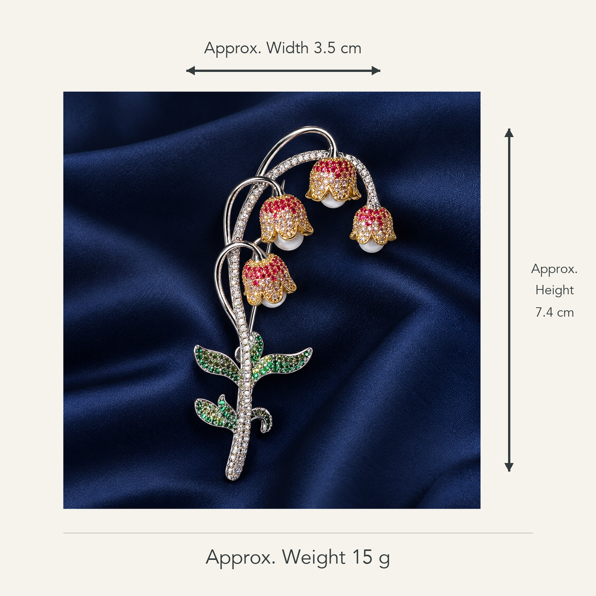 Lily of the valley brooch with mixed-tone white bead drops, approximately 3.5 cm wide by 7.4 cm high, 15 g