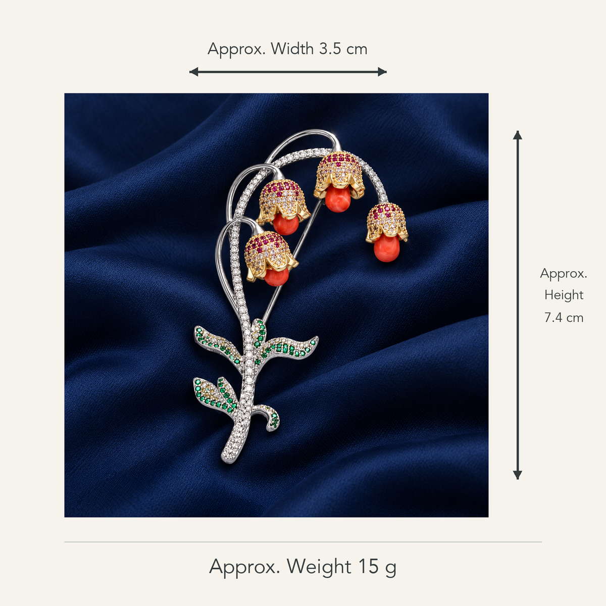 Lily of the valley brooch with mixed-tone red stone drops, approximately 3.5 cm wide by 7.4 cm high, 15 g