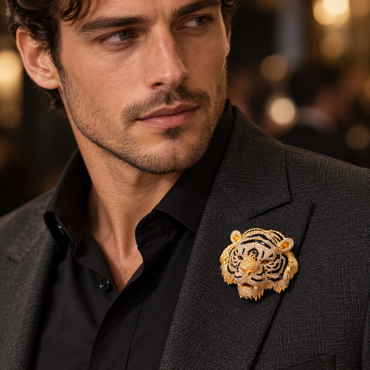 Gold-tone tiger head brooch worn on clothing
