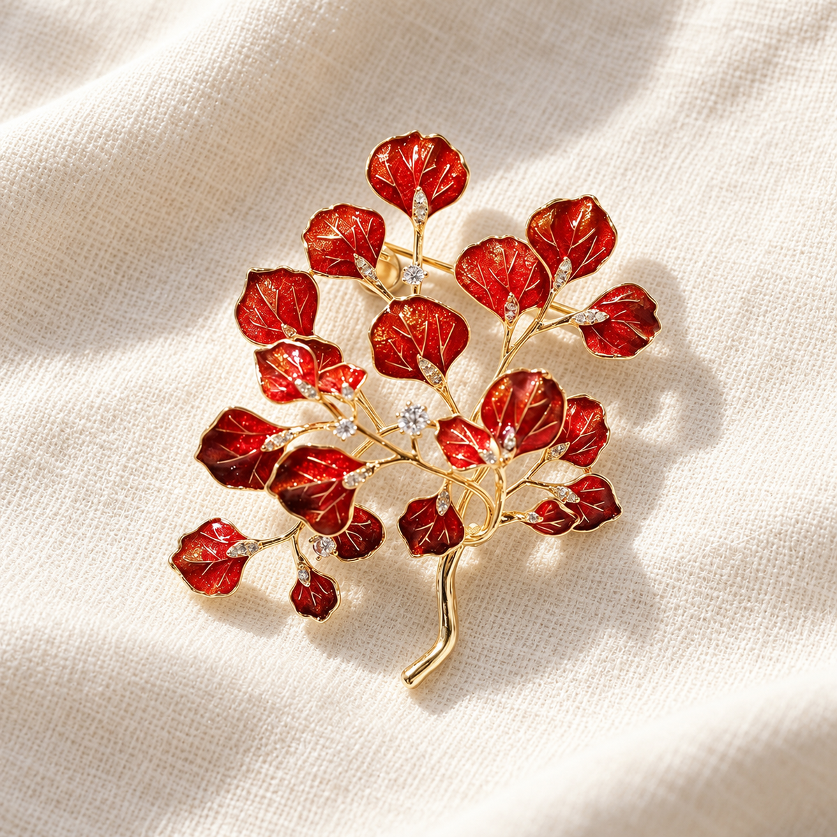 Red Eucalyptus brooch in a tabletop setting