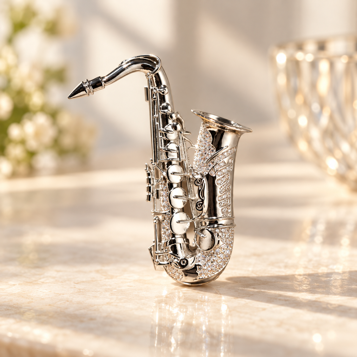 Silver tone saxophone brooch on a tabletop