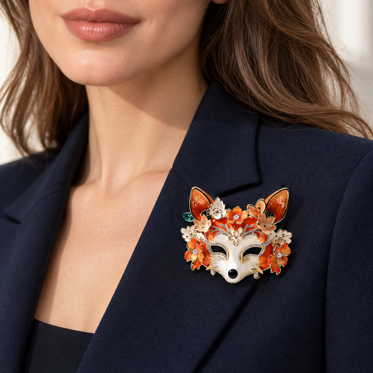 Glossy floral fox mask brooch worn on a blazer
