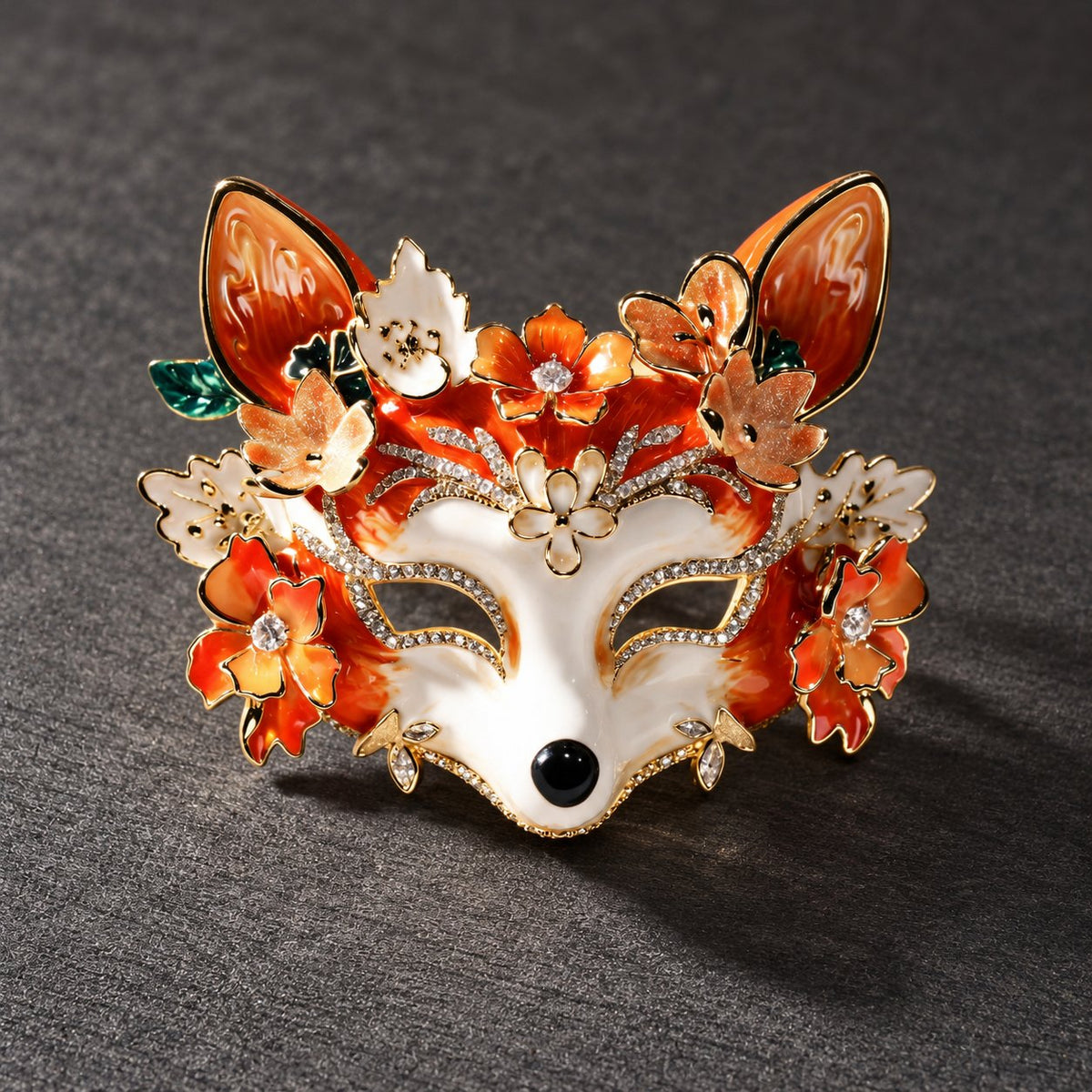 Glossy floral fox mask brooch, front view