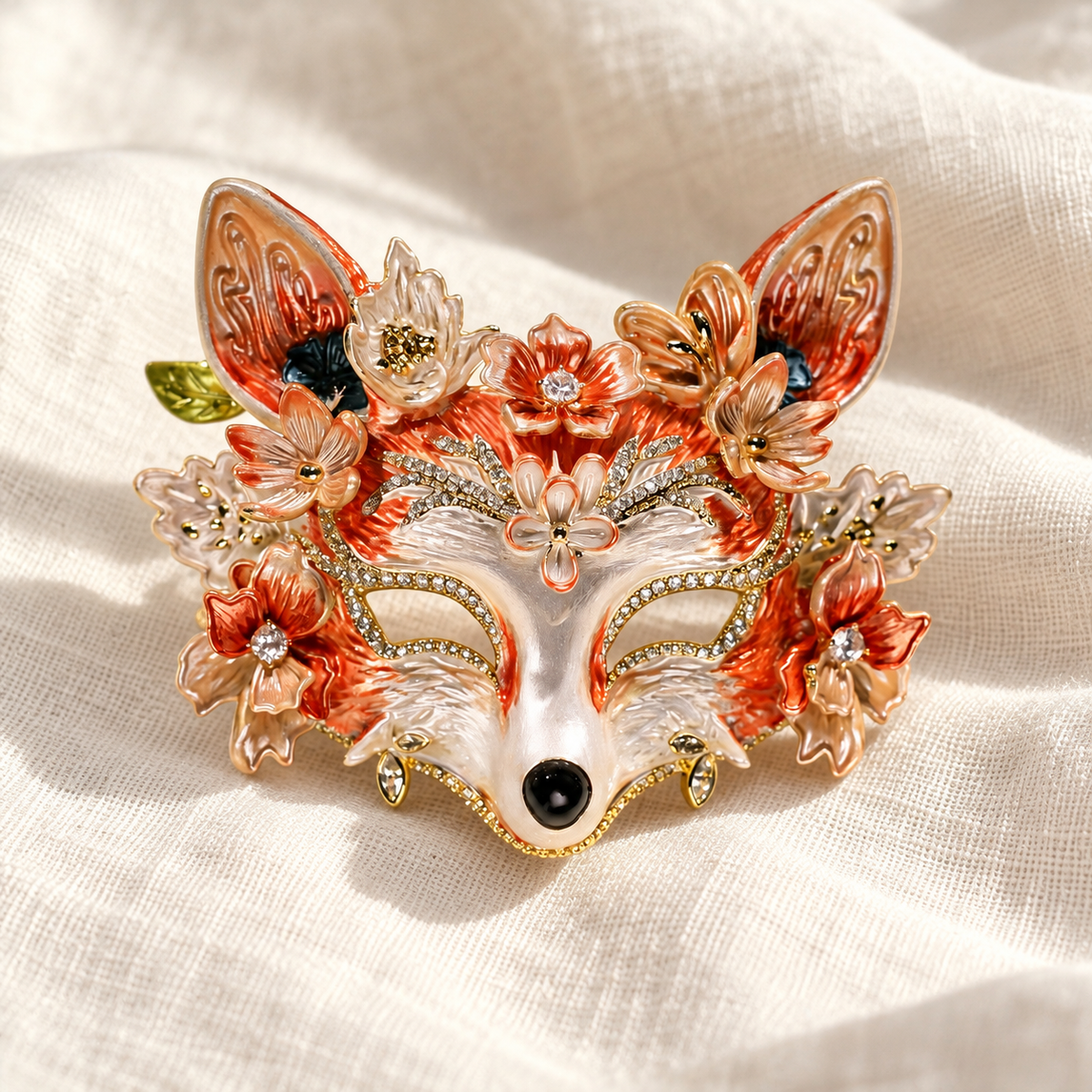 Vintage floral fox mask brooch on soft fabric