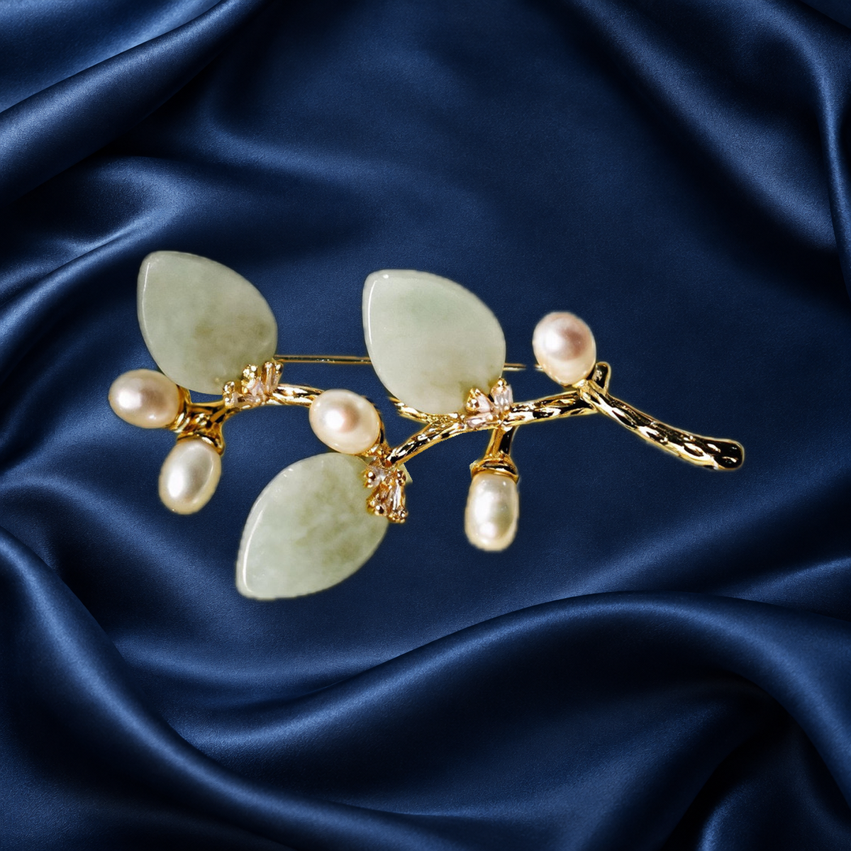 Light Green natural stone flower branch brooch with freshwater pearls on navy satin