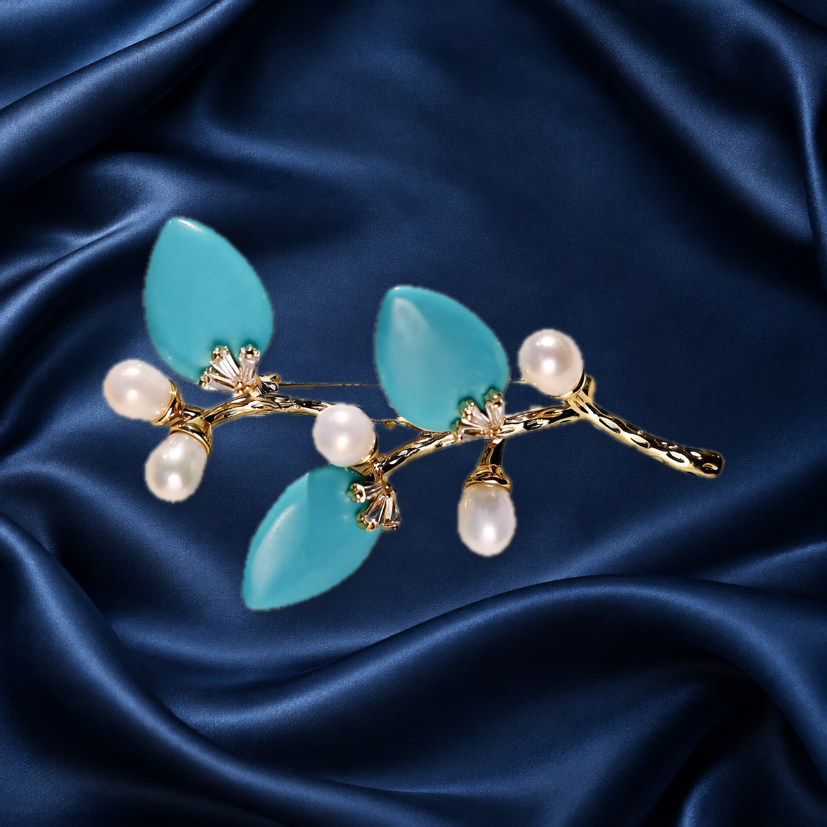 Blue natural stone flower branch brooch with freshwater pearls on navy satin