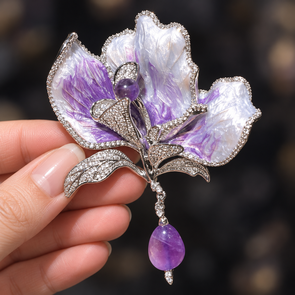 Purple with Purple Stone Drop canna flower brooch held in a hand