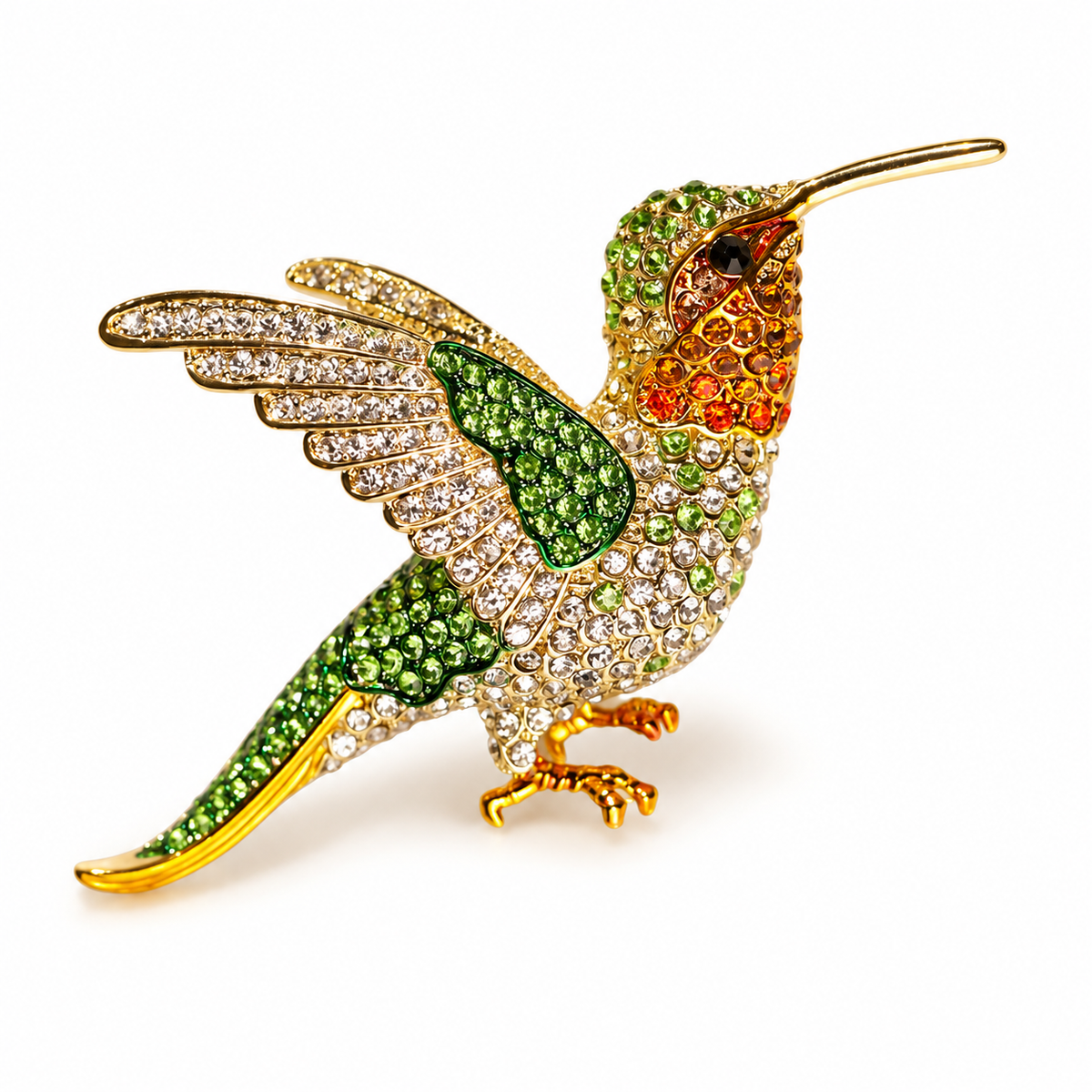 Green hummingbird brooch against a clean light background