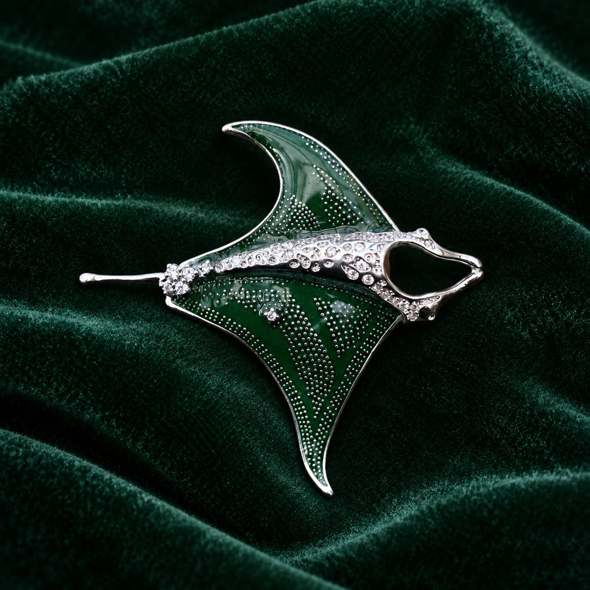 Green enamel manta ray brooch, front view