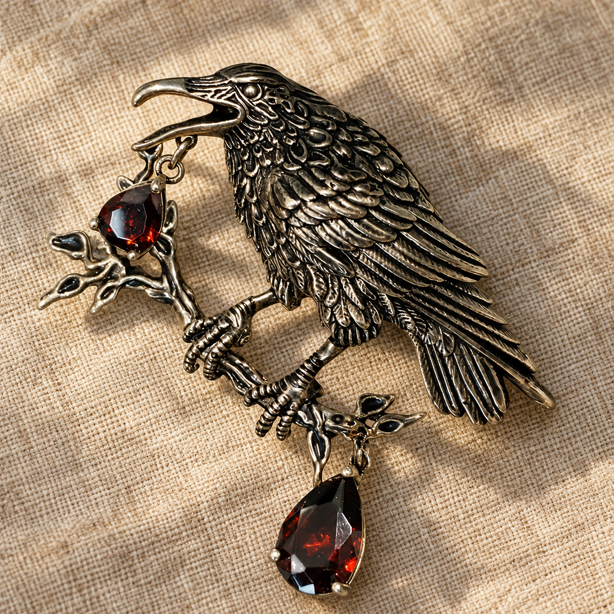 Dark raven brooch in a tabletop display